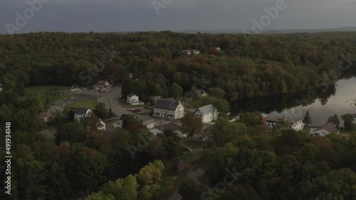 Monson Town, Maine in early Fall orbiting aerial view  photo