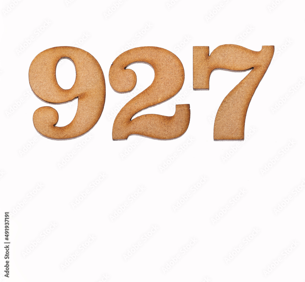 Number 927 - Piece of wood isolated on white background