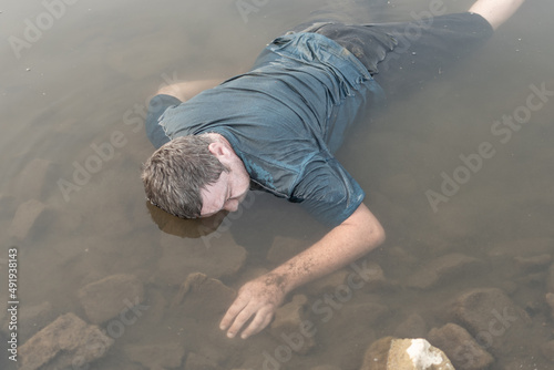 a dead man was found near the river, a dead man was drowned in a pond lake swamp