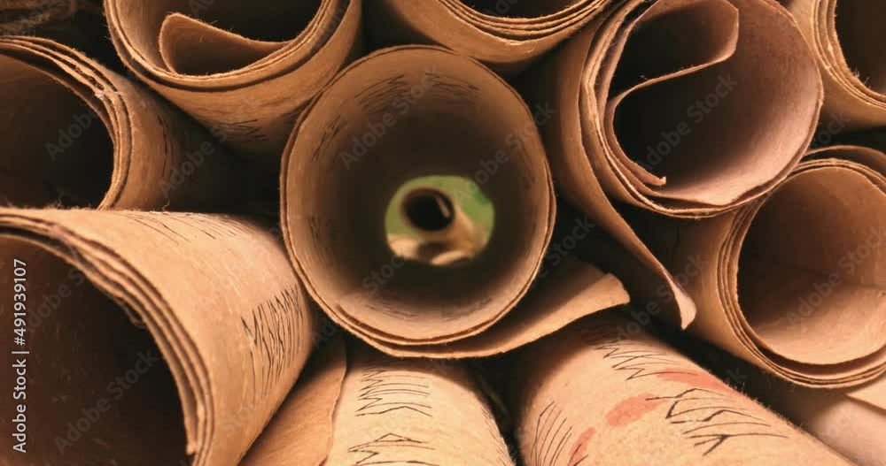 Ancient scribe library. Futhpak scrolls stacked on a pile. Ancient scribe library. Futhpak scrolls stacked on a pile.