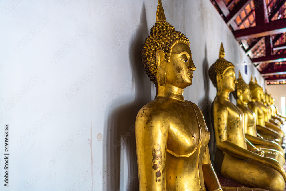 Old Beautiful Golden Buddha Many statues at Wat Phra Si Rattana Mahathat also colloquially referred to as Wat Yai is a Buddhist temple It is a major tourist is Public places in Phitsanulok,Thailand.