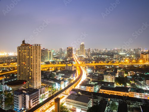 High angle view of Bangkok, an urban area with sky train tracks © srisawat