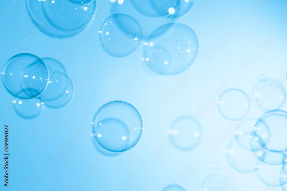 Transparent Blue Soap Bubbles Floating Texture Background.	
