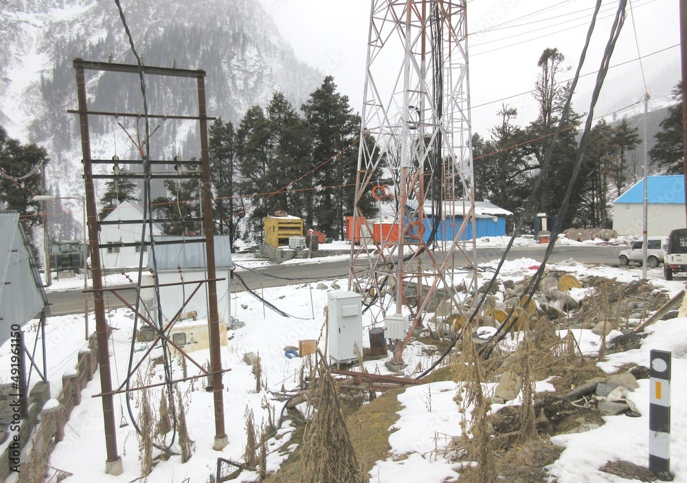 A transformer in cold region snow covered area,It is a passive component that transfers electrical energy from one electrical circuit to another circuit