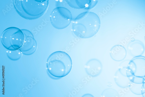 Transparent Blue Soap Bubbles Floating Texture Background. 
