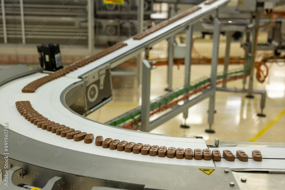 Production of chocolate bars. Confectionery factory.