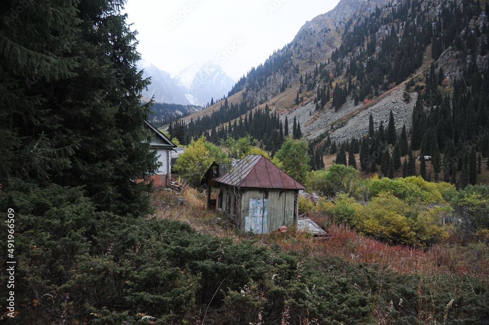 Almaty / Kazakhstan - 09.15.2014 : Old dilapidated buildings made of wood for lost tourists in the mountains and a temporary base for mountaineers-rescuers.