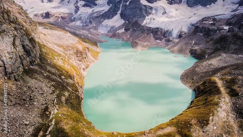 Chitta Katha Lake is an Alpine Lake located in Shounter Valley, Azad Kashmir, Pakistan. It is located at the elevation of 13,500 feet. photo