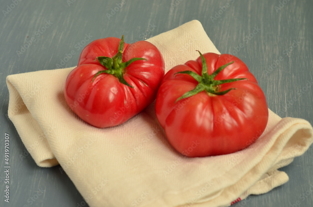 tomatoes on a wooden table tomatoes on a wooden table