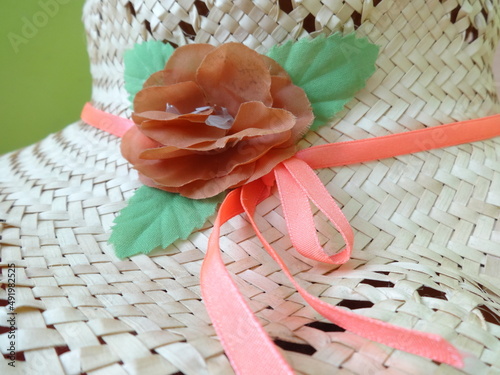 Summer Holiday Straw Woman Hat with a Red Rose Decortion photo