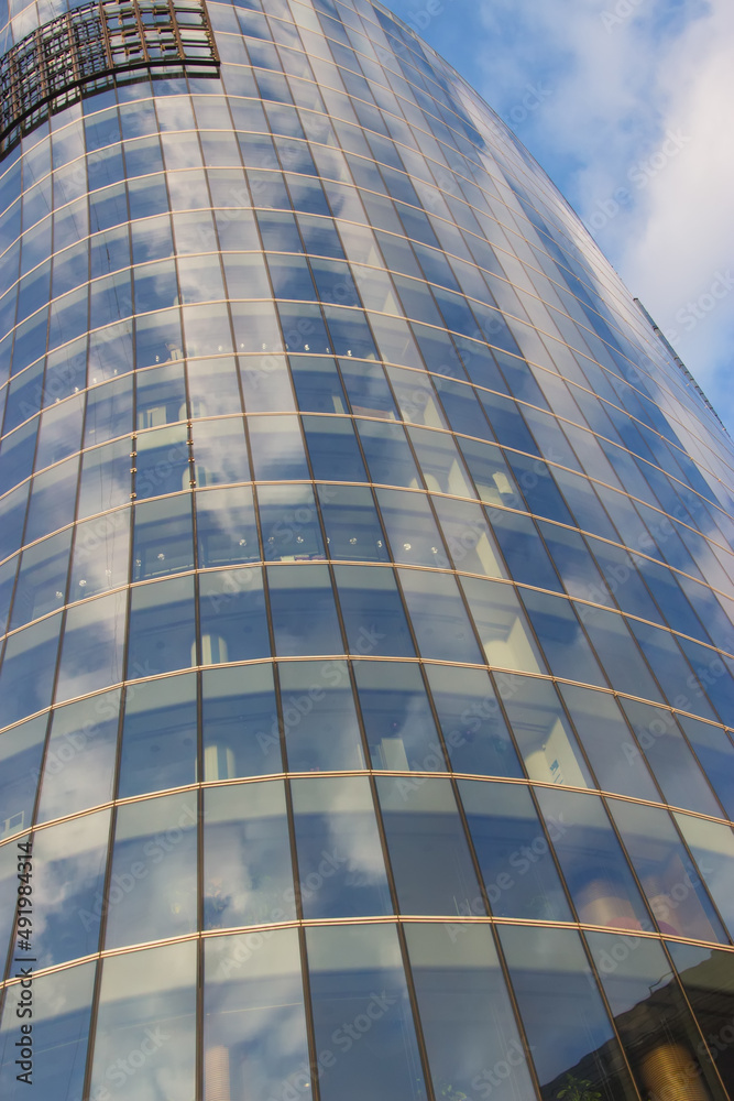Modern real estate glass facade tower. Architecture details. Modern real estate glass facade tower. Architecture details.