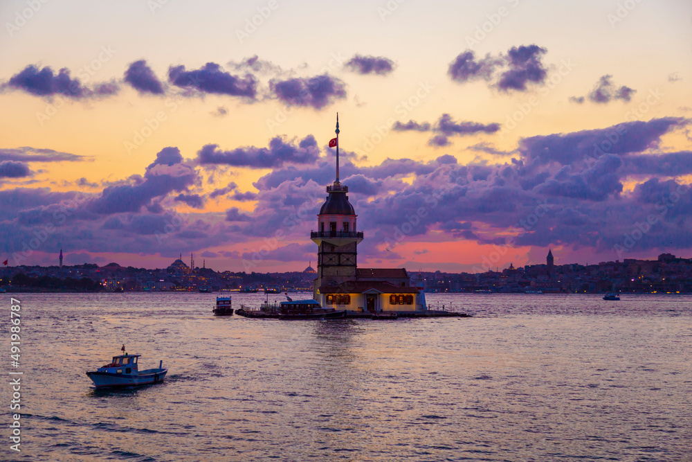 Maidens Tower at sunset, İstanbul. Beautiful clouds with blue sky. Historical light house of İstanbul