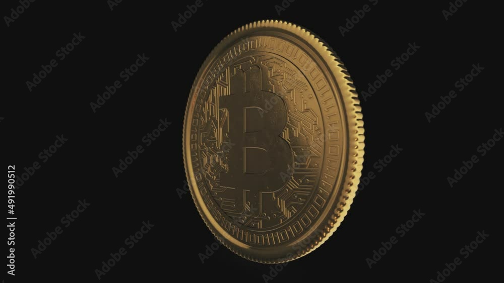 Video animation of a golden rotating bitcoin over dark reflecting background. Cryptocurrency