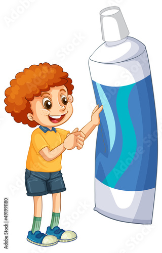 A little boy holding toothpaste on white background