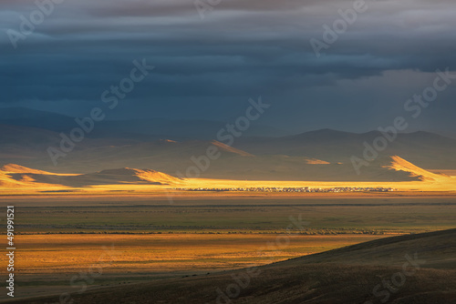 steppe sunset mountains village sunlight rain clouds