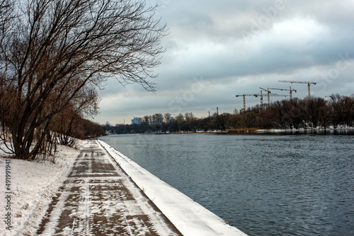 river bank on a cloudy winter day © moskvich1977