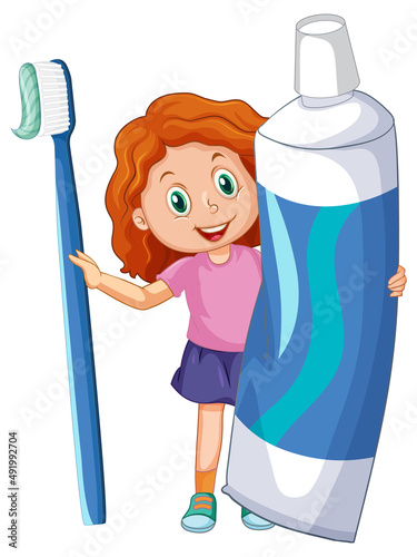 A little girl holding toothpaste and toothbrush on white background