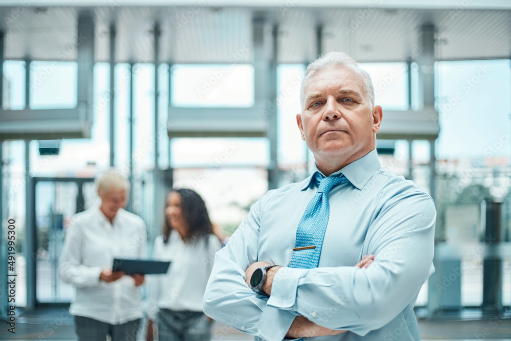 confident business man standing in the lobby of a business center. close-up. confident business man standing in the lobby of a business center. close-up.