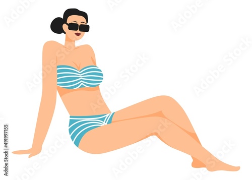 Woman in fashionable swimming suit in sunglasses