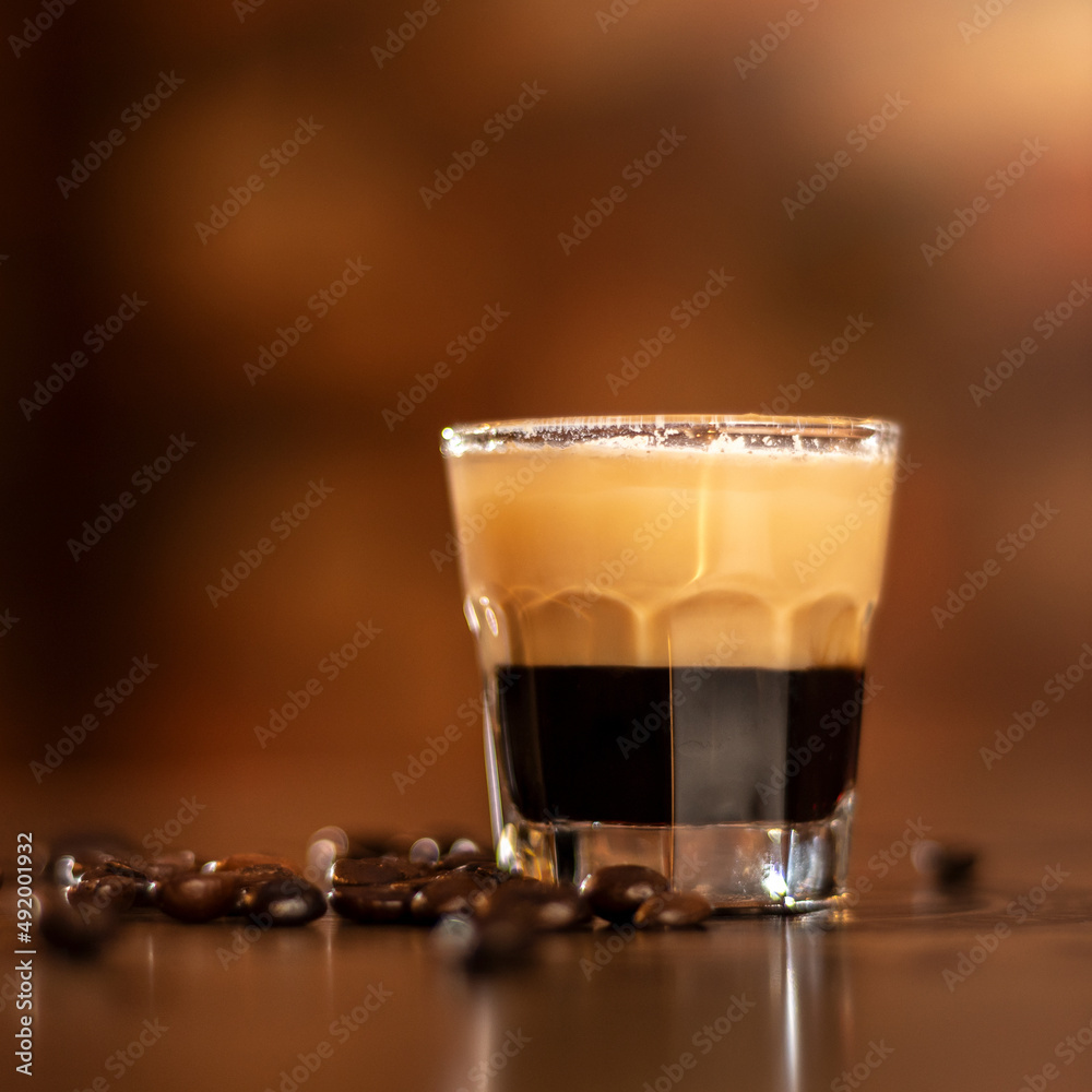 tasty coffee shot on wooden bar table square frame tasty coffee shot on wooden bar table square frame