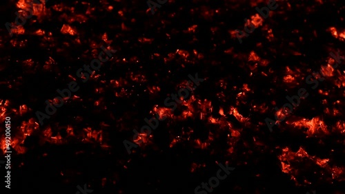 Smoldering embers footage on a black background
