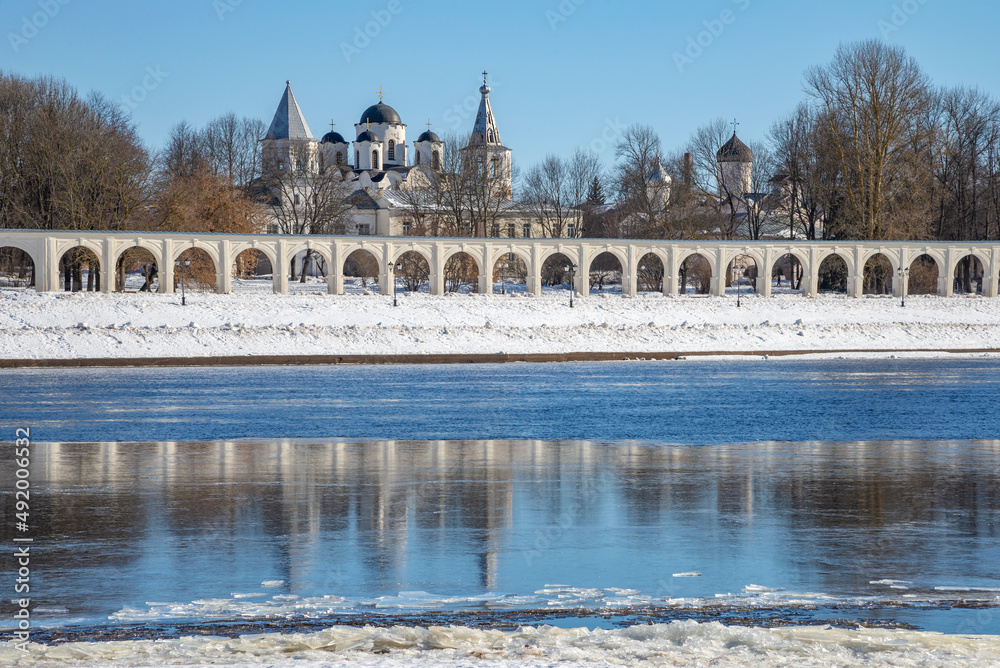 Ice drift on the Volkhov River at the old Gostiny Dvor, early spring. Veliky Novgorod, Russia