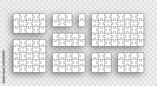 Puzzle pieces set. Jigsaw outline grid. Scheme of thinking game. Modern background with separate shapes. Simple frame tiles. Laser cutting template. Mosaic silhouette. Vector illustration.