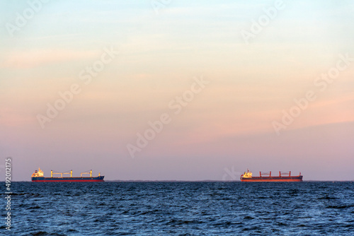 Merchant ships lining up at the port