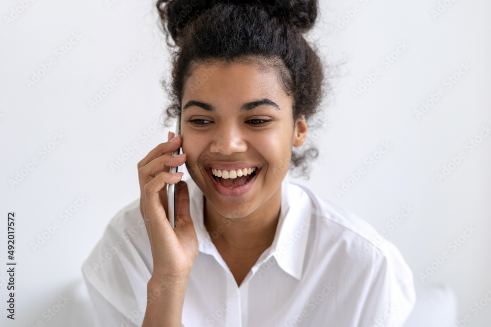 Pretty afro american girl answering call by cellular Pretty afro american girl answering call by cellular