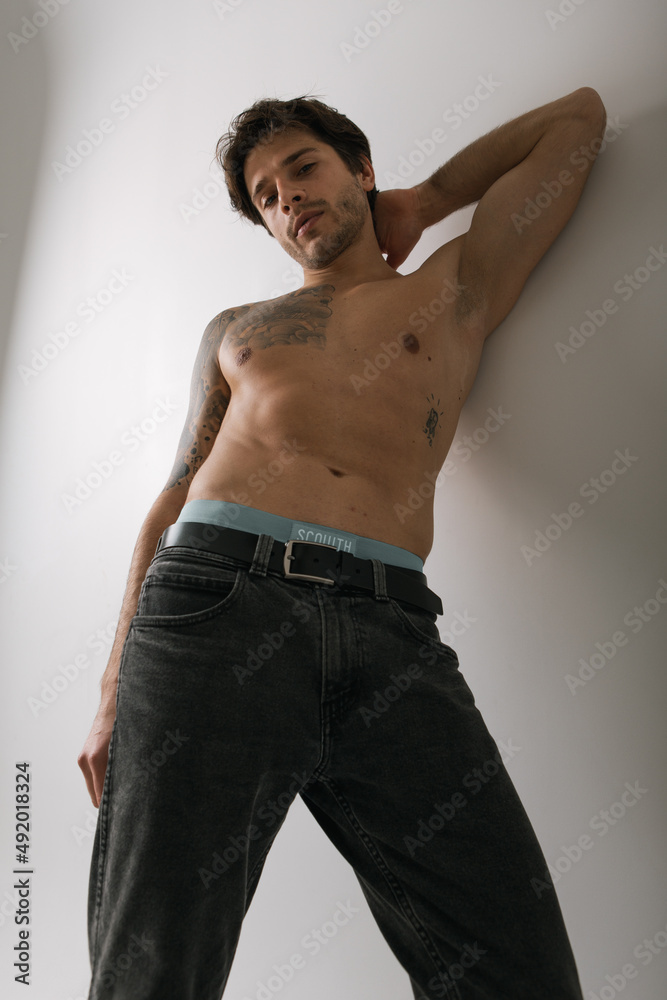 Emotional portrait of a handsome guy with an athletic figure Emotional portrait of a handsome guy with an athletic figure