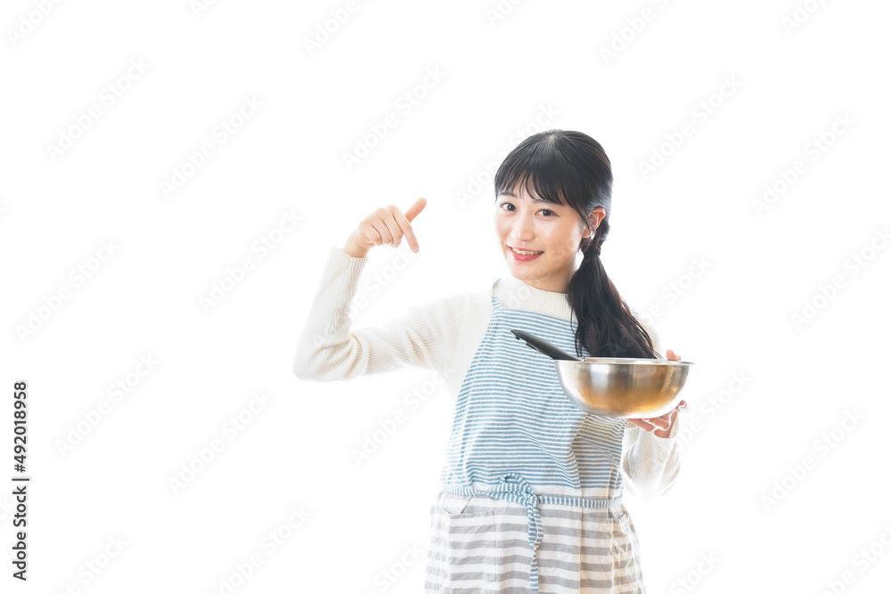 クッキング教室に通う若い女性 クッキング教室に通う若い女性