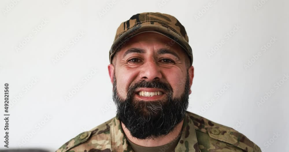 Mature military man smiling on camera Mature military man smiling on camera