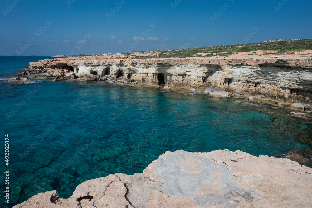 coast in ayia napa sea caves in cape greco in cyprus on the seashore with rocks