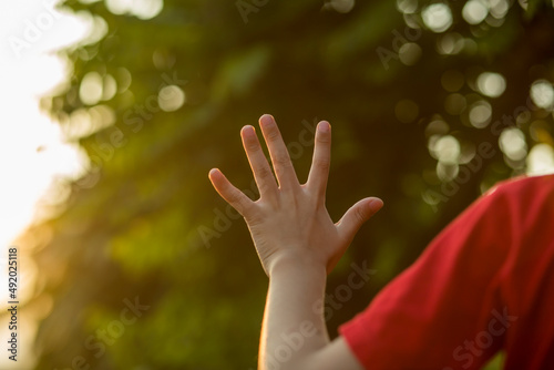 Technology, hand holding with environment Icons over the Network connection on green background