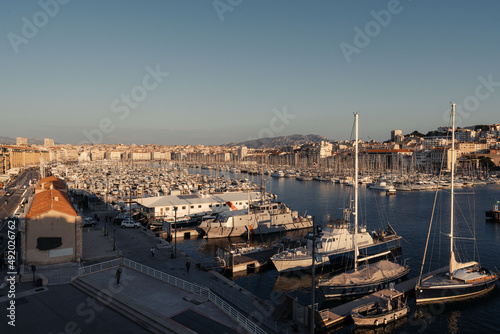 Boats in the old port and modern buildings in Marseille, France