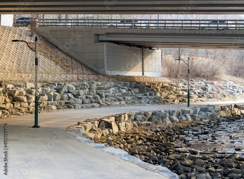 Path by the river in the city 