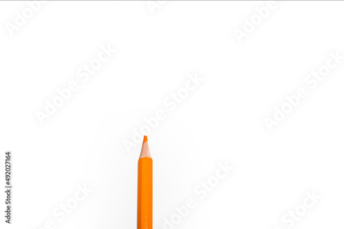 Orange color wooden pencil isolated on white background