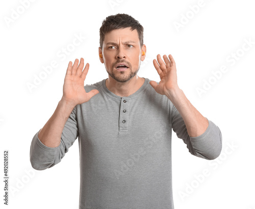 Annoyed handsome man with y...