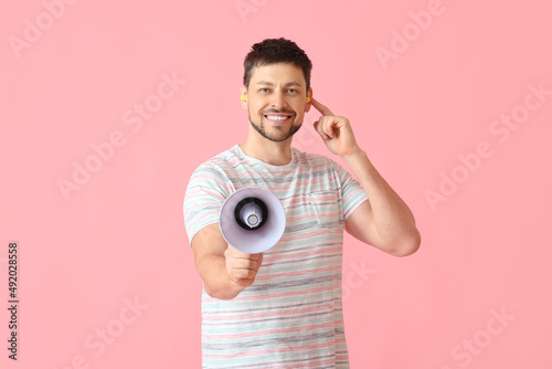 Handsome man with ear plugs...