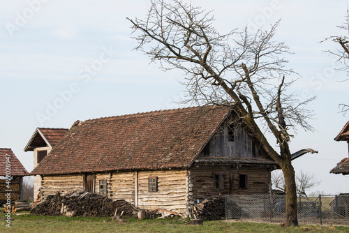 Sunja, Croatia, April 20,2021 :Abandoned traditional old wooden house.  © A1