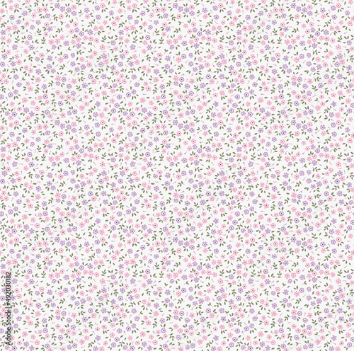 Spring flowers print. Vector seamless floral pattern. Floral design for fashion prints. Endless print made of small pastel lilac and pink flowers. Elegant template. White background. Stock vector.