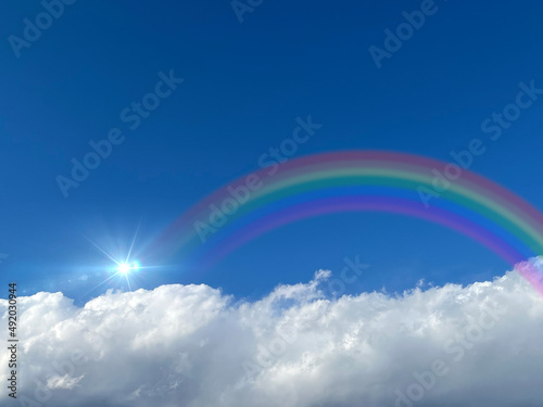 Bright blue sky with rainbow and sunshine_back_05