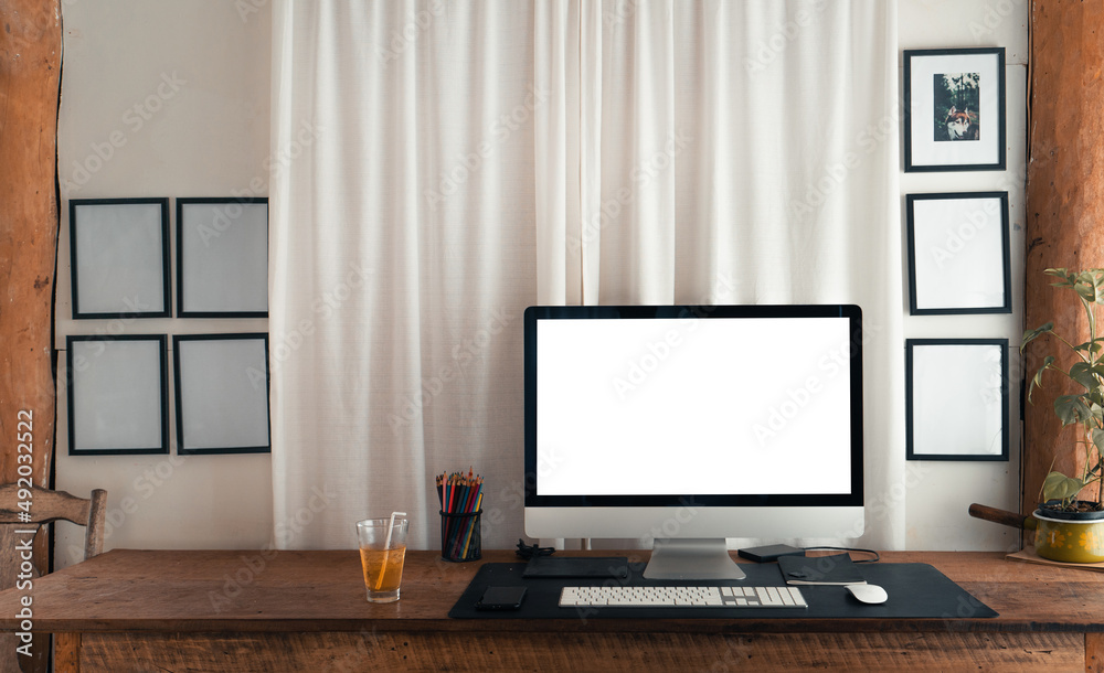 home office desk,Computer screen on a wooden table in the house home office desk,Computer screen on a wooden table in the house