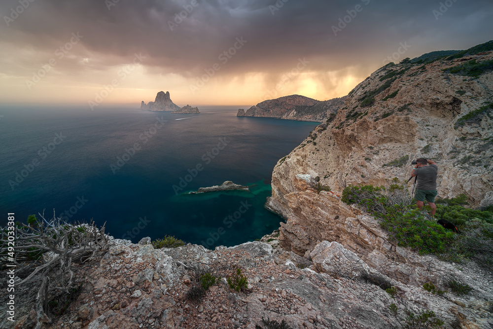 Sunset over the sea , cap Llentrisca with es vedra island , ibiza Stock  Photo | Adobe Stock