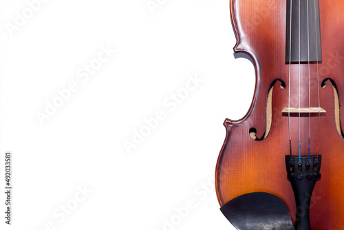 Violin isolate placed horizontally on light wooden floor. Concert rehearsal concept