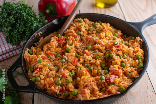 Serbian rice cooked with bell peppers, green peas and aivar