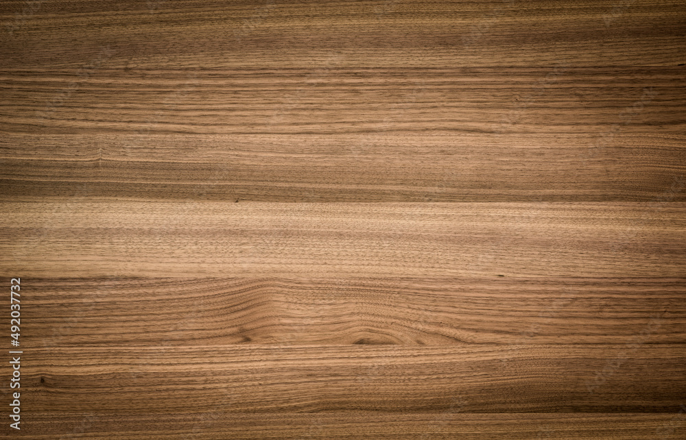 background of Walnut wood surface background of Walnut wood surface
