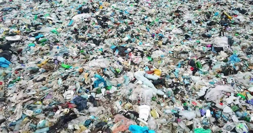 Contaminated ocean beaches with plastic waste, drone photography, garbage platform.