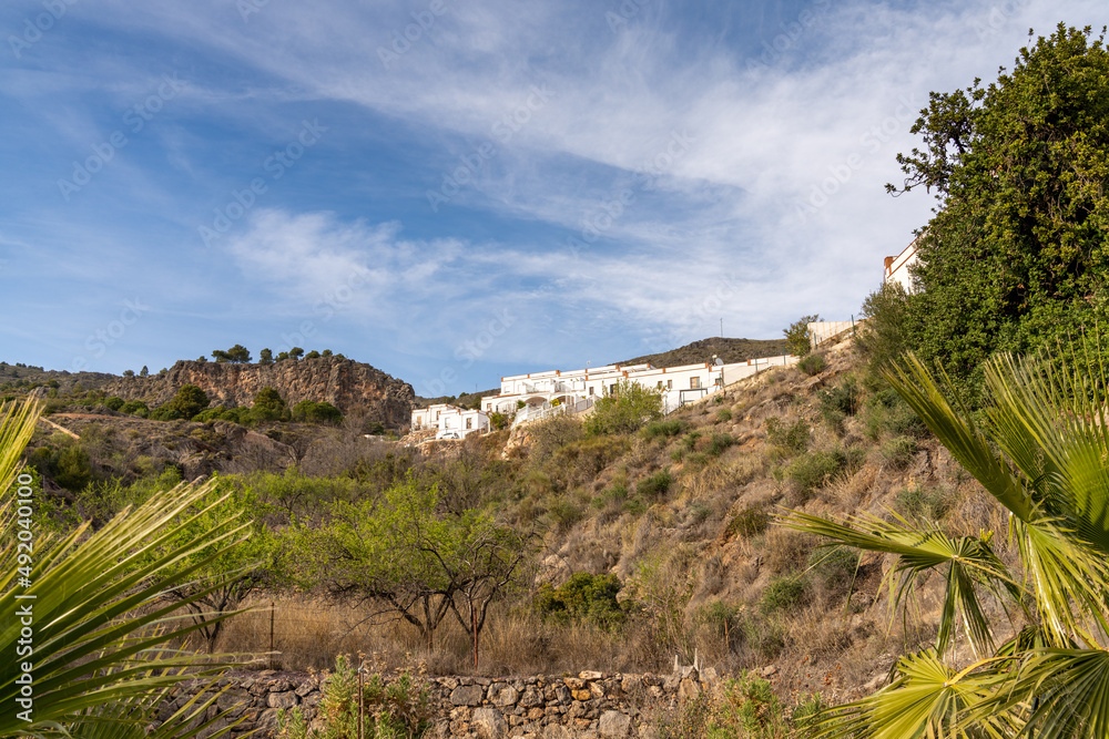view of the idyllic whitewashed Andalusian village of Enix in the backcountry of Almeria Province