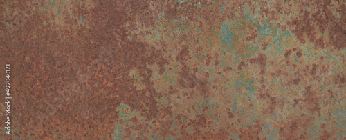 Peeling paint on the rust wall. Empty for design, pattern, cover, overlay texture, background and other, Surface of old steel background. © Ammak